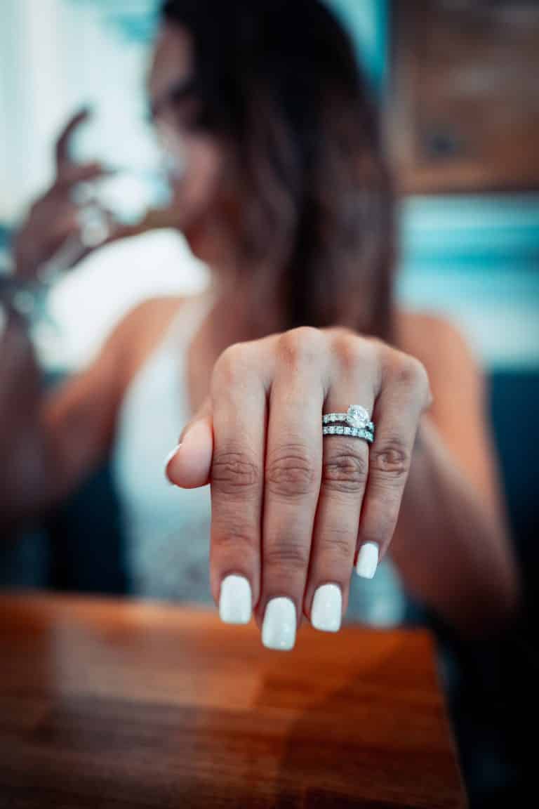 woman showing off engagement ring